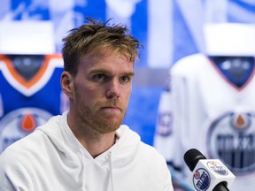 Oilers captain Connor McDavid talks to reporters after practice on Tuesday in Edmonton.