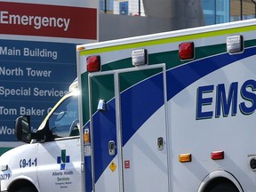 A steady wave of ambulances enter the Foothills hospital in Calgary on Monday, September 27, 2021.