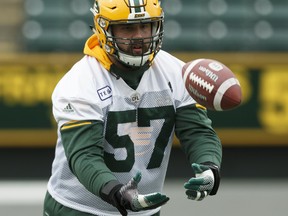 Edmonton Elks centre David Beard (57) catches a ball during practice at Commonwealth Stadium in Edmonton on Oct. 6, 2017.