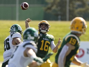 University Alberta Golden Bears' Brad Launhardt (16) looks to pass to Tanner Buchanan (19) during first half Canada West action against the University of Saskatchewan Huskies at Foote Field, in Edmonton Saturday Sept. 21, 2019.