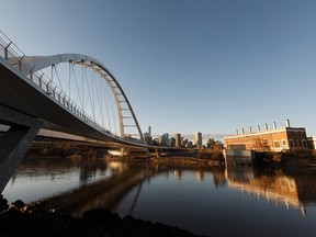 Edmonton's Walterdale Bridge and the Rossdale power plant frame the downtown skyline on May 1, 2020.