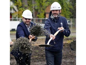 Peter Kefalas, left, Principal, Open Sky Developments Ltd., and Edmonton Mayor Don Iveson throw some dirt at a ground-breaking ceremony held at the site of the Jameson in early September.