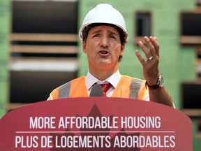 Justin Trudeau makes an announcement at the site of an affordable housing complex in downtown Hamilton, Ontario in July.