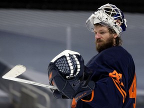 The Edmonton Oilers' goalie Mike Smith (41) during second period NHL action against the Calgary Flames at Rogers Place, in Edmonton Thursday April 29, 2021. Photo by David Bloom