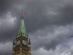 OTTAWA -- September 13, 2021 -- The Canadian flag at half mast above the Peace Tower on Parliament Hill, Monday, September 13, 2021. ASHLEY FRASER, POSTMEDIA