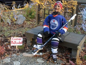 Connor McDeadvid patiently sits on the bench in front of a house in south Westmount.