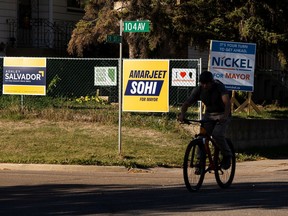 A house displaying municipal election signs at 104 Avenue and 79 Street in Edmonton, on Friday, Oct. 1, 2021.