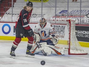 Giants winger Justin Lies and Blazers goalie Dylan Garand, who have only have eyes for the puck during a game between the rival teams last April, again feature for their clubs this Western Hockey League season.