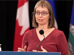 Dr. Deena Hinshaw, Alberta chief medical officer of health, responds to a reporter's question during a Government of Alberta COVID-19 press conference announcing new measures in schools in Edmonton, on Oct. 5, 2021.