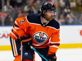 Edmonton Oilers' Duncan Keith (2) is seen during a faceoff with the Vancouver Canucks during the second period of preseason NHL action at Rogers Place in Edmonton, on Thursday, Oct. 7, 2021. Photo by Ian Kucerak