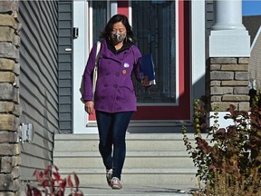 Keren Tang door knocking in her riding as she's running in the civic election for councillor in Ward (11) Karhiio in south Edmonton, October 14, 2021. Ed Kaiser/Postmedia