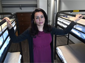 Catholic Social Service's (CSS) employee Hellay Naikyar, who is an Afghan refugee and CSS Settlement Worker, has been supporting Afghanis arriving standing in one of the welcome suites bedroom, as CSS is issuing a public appeal for donations to help meet the urgent needs of those who have recently arrived from Afghanistan, in Edmonton, October 26, 2021.