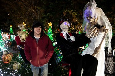 Jerry Dolynchuk's home is decked out in Halloween and Christmas decorations as a representation of how the former holiday is "invading" the latter. The home, at 97 Street and 144 Avenue, draws vistors each day and night who come to see the fun displays of Halloween monsters mixing with Christmas cheer.