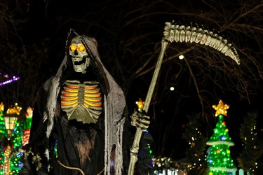 Jerry Dolynchuk's home is decked out in Halloween and Christmas decorations as a representation of how the former holiday is "invading" the latter. The home, at 97 Street and 144 Avenue, draws vistors each day and night who come to see the fun displays of Halloween monsters mixing with Christmas cheer.