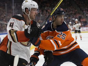 Darnell Nurse in action as Edmonton Oilers battle Anaheim Ducks in less-complicated times. Tonight's scheduled game between the two clubs has been postponed, while Nurse himself has entered COVID protocol.