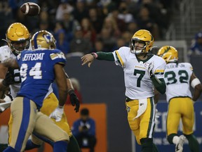 Edmonton Elks quarterback Trevor Harris (7) throws against the Winnipeg Blue Bombers in Winnipeg on Friday, Oct. 8, 2021.