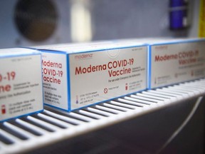 This file photo taken on October 14, 2021 shows boxes containing vials of the Moderna Covid-19 vaccine stored at the Kedren Community Health Center in Los Angeles, California.