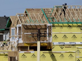 The residential industry is cautiously optimistic about the near future, says Scott Fash of BILD Alberta.



Crews work on a house under construction, in Edmonton Wednesday April 14, 2021. Photo by David Bloom