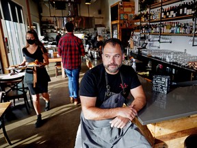Paul Shufelt, owner of Workshop Eatery in southeast Edmonton, says supplies and food cost increases have forced him to increase prices on his restaurant menu by 10-15 per cent, partly to offset his costs but also to give back to his employees.