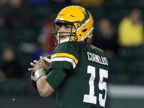 The Edmonton Elks' quarterback Taylor Cornelius (15) battles the Winnipeg Blue Bombers during first half CFL action at Commonwealth Stadium in Edmonton on Sept. 18, 2021.