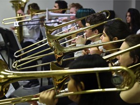 The brass section rehearses with the Clover Bar Junior High band ahead of the at the 109th Kiwanis Music Festival in Edmonton.