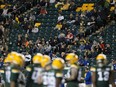 Football fans watch the Edmonton Elks battle the Winnipeg Blue Bombers at Commonwealth Stadium in Edmonton on Sept. 18, 2021.