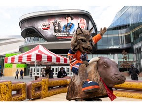 Hunter, the Edmonton Oilers mascot, rides during PBR's official mechanical bull challenge for the 2021 PBR Canada National Finals outside of Rogers Place in Edmonton on Friday, Nov. 12, 2021.