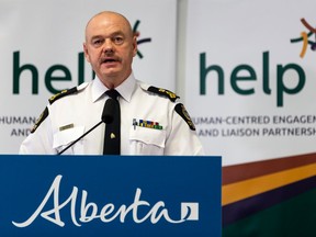 Edmonton Police Service Chief Dale McFee speaks during the Alberta government's announcement of an additional $600,000 in funding for the Edmonton Police Service's Human-centred Engagement and Liaison Partnership (HELP) teams in Edmonton on Nov. 19, 2021.