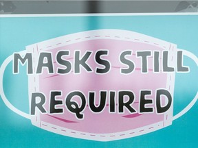 Edmonton city council added two triggers to the mask bylaw Monday, prompting a review by council within 30 days of the two triggers being met.