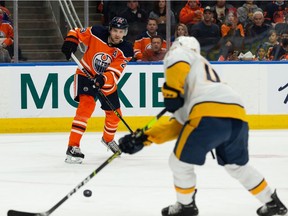 Edmonton Oilers' Leon Draisaitl (29) passes past Nashville Predators defence during first period NHL action at Rogers Place in Edmonton, on Wednesday, Nov. 3, 2021.