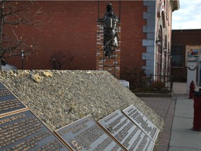 Bronze plaques have been stolen from the Firefighters Memorial Plaza for the second time this year in Old Strathcona in Edmonton, Friday, Nov. 5, 2021.