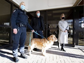 EPS Staff Sgt. Anna Sinclair, right, Const. Ilka Cunningham, left, and Const. Ted Dyck, middle, talk about the formation of the animal cruelty investigation unit on Tuesday, Nov. 23, 2021.