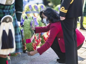 Minister of National Defence Anita Anand lays a wreath at the cenotaph during a Remembrance Day ceremony at Chris Vokes Memorial Park in Oakville, Ont., Sunday Nov. 7, 2021.