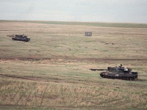 File photos from CFB Suffield in southern Alberta from the early 1990s. CFB Suffield Alberta--Canadian military Leopard-C2 cross a field during training exercises at CFB Suffield in southern Alberta.