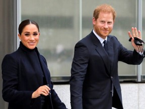 Britain's Prince Harry and Meghan, Duke and Duchess of Sussex, wave as they visit One World Trade Center in Manhattan, New York City, U.S., September 23, 2021.