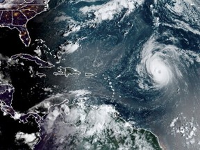 A satellite image shows Hurricane Larry in the Atlantic Ocean, east of the Leeward Islands September 5, 2021.