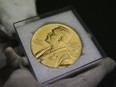 An Nobel prize medal is seen at the Science and Tech museum in Ottawa July 20, 2011.