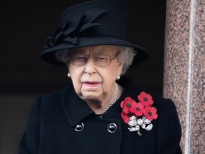 In this Nov. 8, 2020 file photo, Queen Elizabeth attends the National Service of Remembrance at The Cenotaph on Whitehall in London.