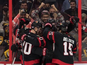 The Ottawa Senators celebrate a goal scored against the Pittsburgh Penguins at the Canadian Tire Centre. (Marc DesRosiers-USA TODAY Sports )