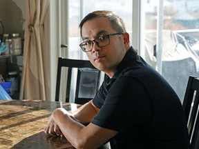 Herman Koo at his home in Edmonton on November 5, 2021. Herman was shot in the head while driving home in 2018 by a man on a random crime spree and was not expected to survive. There have been severe social impacts from the COVID-19 pandemic on people like Herman who live with disabilities.