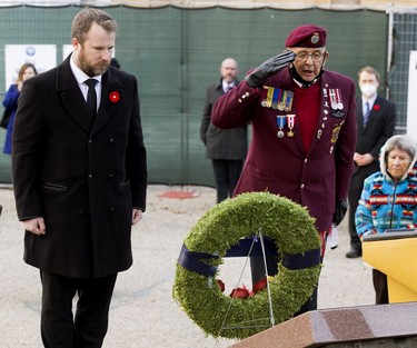 Brad Rutherford, MLA for Leduc-Beaumont and Military Liaison to the Canadian Armed Forces and Indigenous veteran Walter (Wally) Sinclair lay a wreath at the Aboriginal Veterans Memorial on the Alberta Legislature grounds in Edmonton, Monday Nov. 8, 2021.