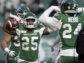 Saskatchewan Roughriders returner Jamal Morrow (25) celebrates his first-half punt return for a touchdown in Sunday's West Division semi-final.