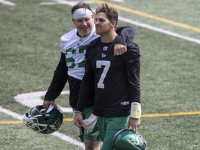 Saskatchewan Roughriders centre Dan Clark, left, and quarterback Cody Fajardo are among the key starters who will be rested Saturday when the team plays in Hamilton.