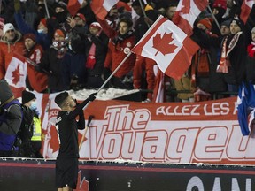 Team Canada's celebrates after defeating Team Mexico 2-1 at the FIFA 2022 World Cup qualifier soccer match held at Commonwealth Stadium on Tuesday, Nov. 16, 2021 in Edmonton.
