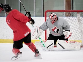Team Canada goalie Brett Brochu of Tilbury makes a save during practice Tuesday at the Fenlands Banff Recreation Centre in Banff, Alta. Brochu will start for Canada in its second game at the world junior hockey championship on Tuesday.