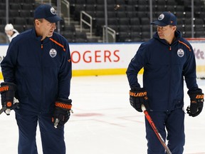 Associate coaches Jim Playfair (left) and Glen Gulutzan have their work cut out for them in Dave Tippett's absence.