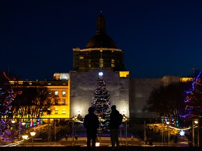 Visitors take in holiday lights during the annual Legislature Light-Up hosted by Premier Jason Kenney in Edmonton, on Thursday, Dec. 2, 2021. The event kicks off Celebrate the Season at the Alberta Legislature. Photo by Ian Kucerak