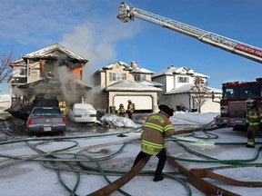 Fire badly damaged a home at 224 Wyman Lane in southeast Edmonton on Monday, Dec. 20, 2021. No injuries were reported.