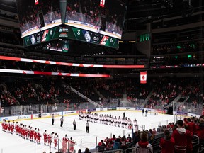 Team Canada players celebrate their 6-3 win over Team Czechia during the IIHF world junior championship at Rogers Place in Edmonton on Sunday, Dec. 26, 2021.