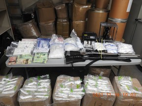 Edmonton police have arrested four men and seized about $4.3M in drugs and buffing agents in two locations in Edmonton. Police found meth, cocaine, guns, ammo and cash.